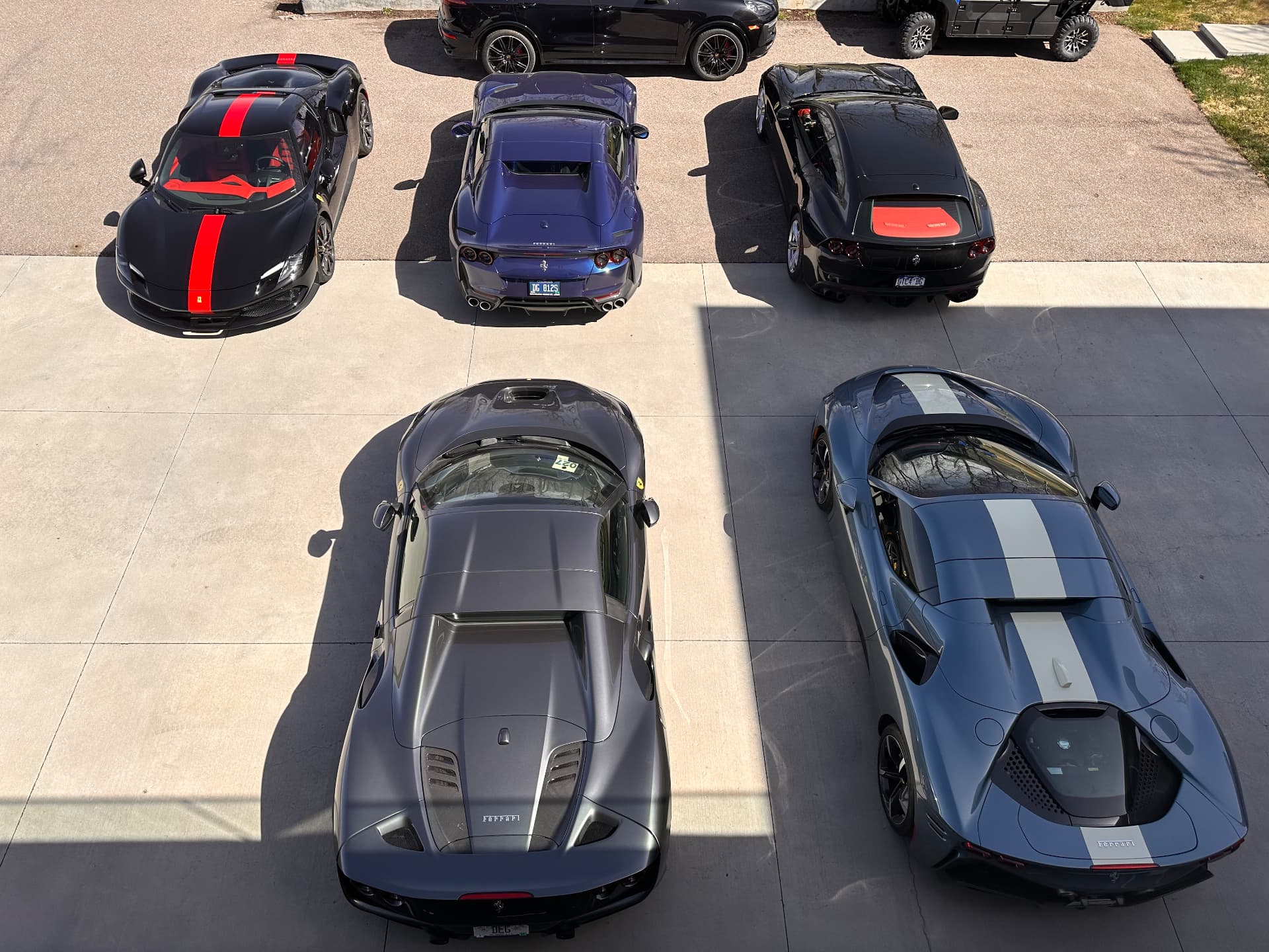 A collection of Ferraris arranged on the motor court of a Roaring Fork Valley estate