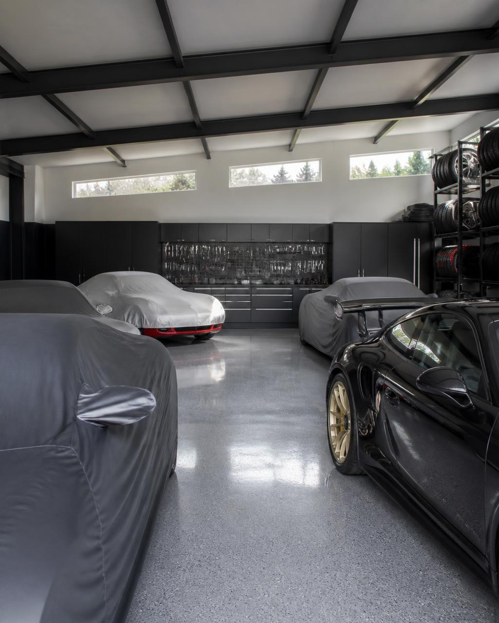 A private garage with a collection of exotic and classic cars